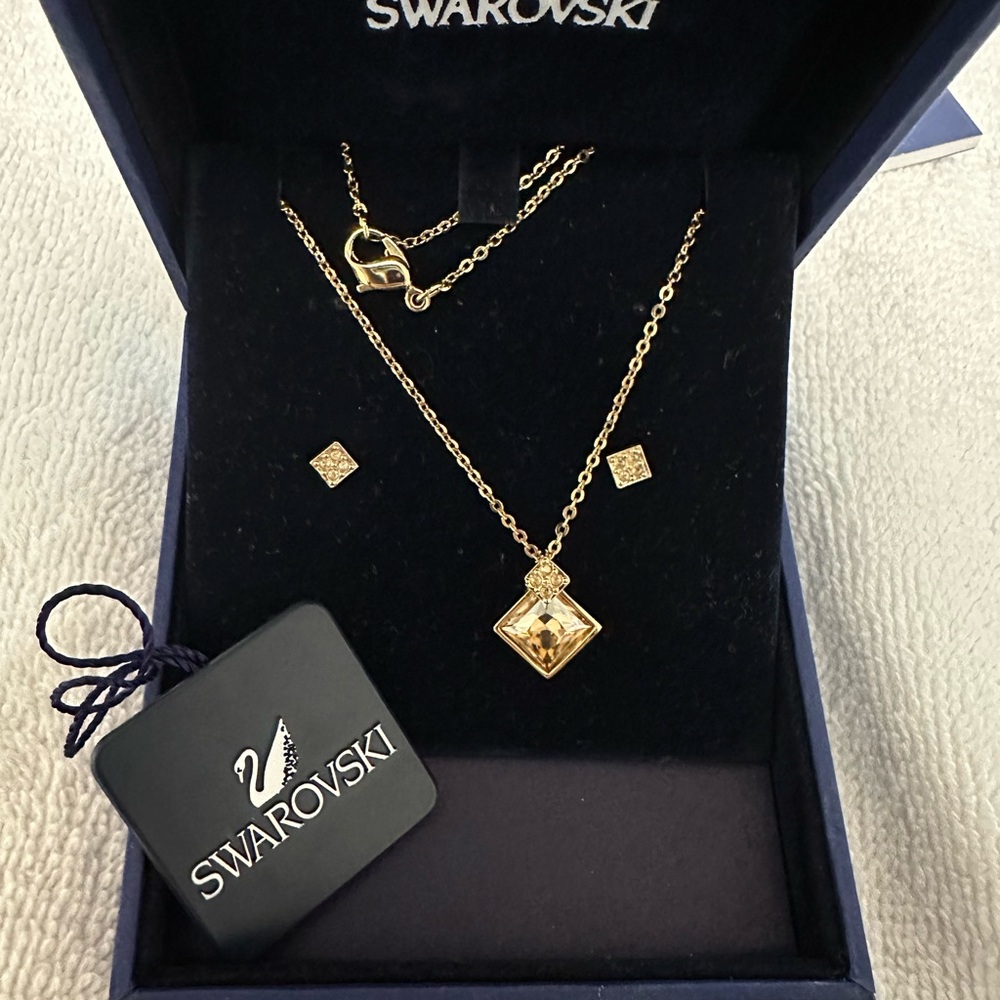 Swarovski Gold necklace and earrings